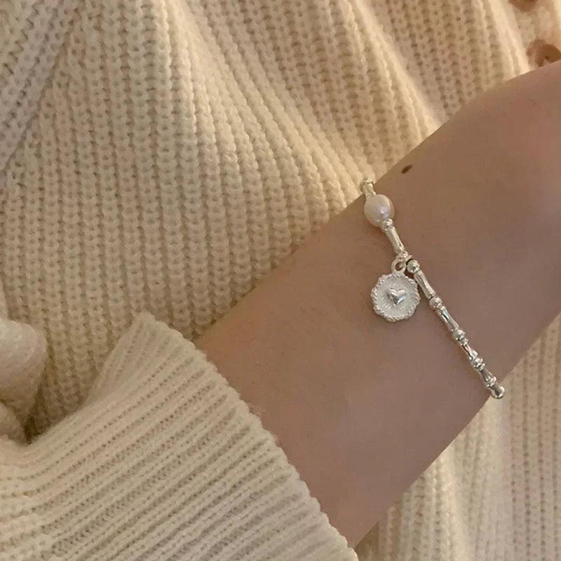 Bracelets in Sterling Silver and Pearl:  Heart Crafted Gifts
