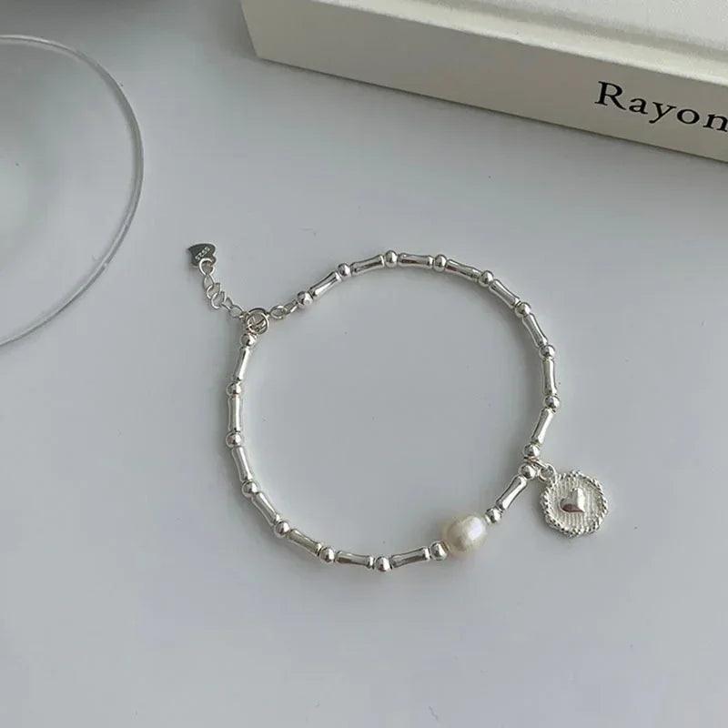 Silver Bracelets with Pearl & Medallion