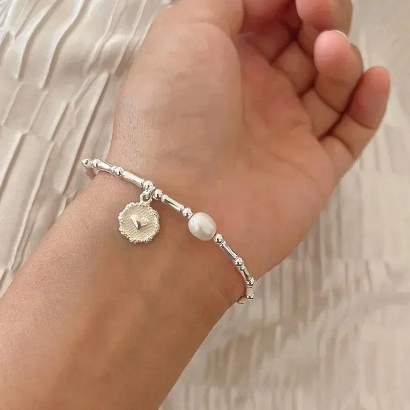 Silver Bracelets with Pearl & Medallion